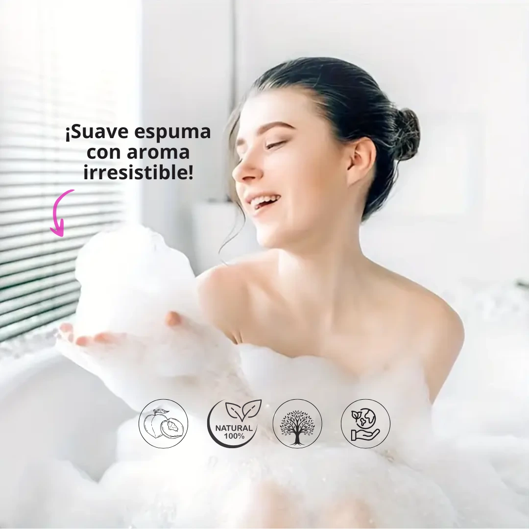 suave espuma con aroma irresistible, mujer en la bañera llena de espuma asociando el jabón rico en espuma que es el jabon piel de melocotón